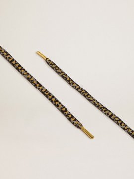 Black and white animal-print laces with contrasting gold stars